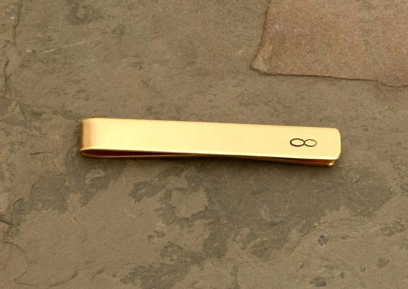 Infinity Brass Tie Clip